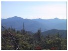 Looking east at Algonquin Peak, Iroquois Mtn, Mt. Marshall, Mt. Colden, Henderson Mtn, Mt. Marcy, Mt. Haystack, Tabletop Mtn, Calamity Mtn